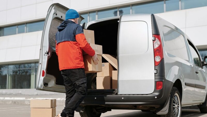 Loading the van with delivery boxes